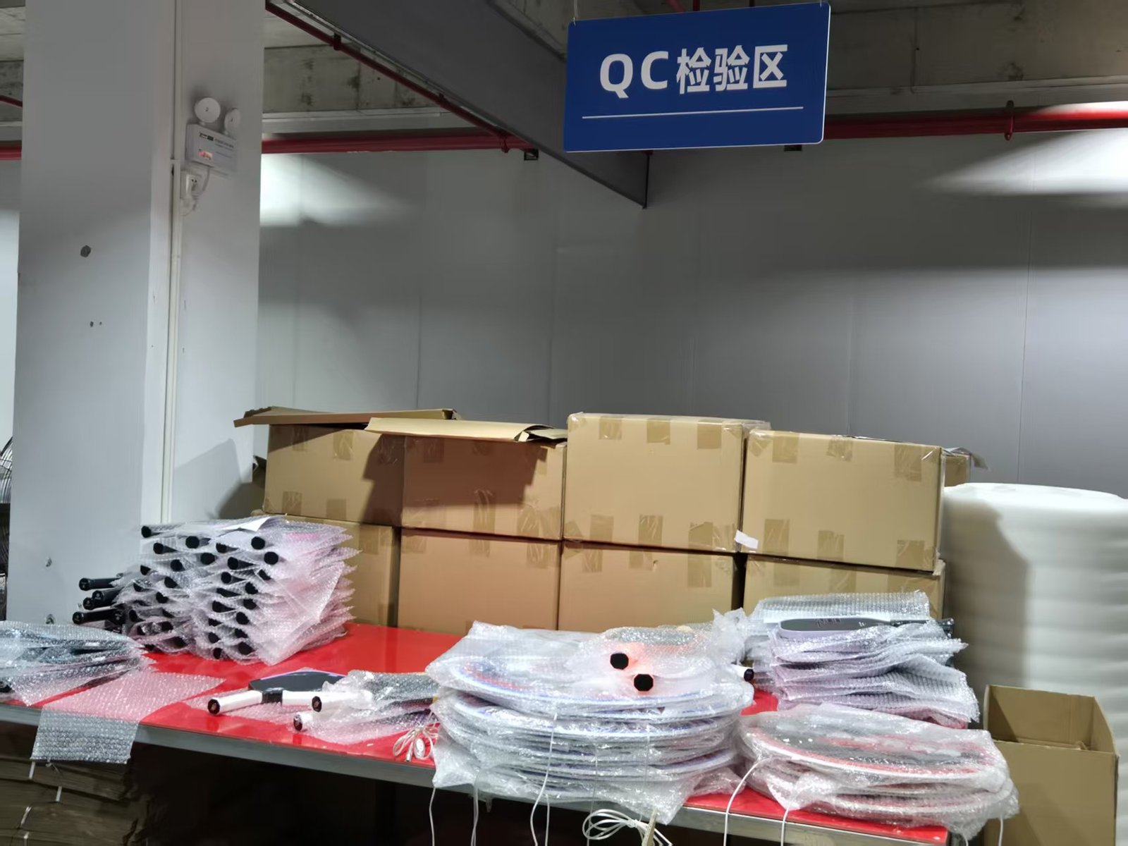quality control inspection of pickleball paddles in factory