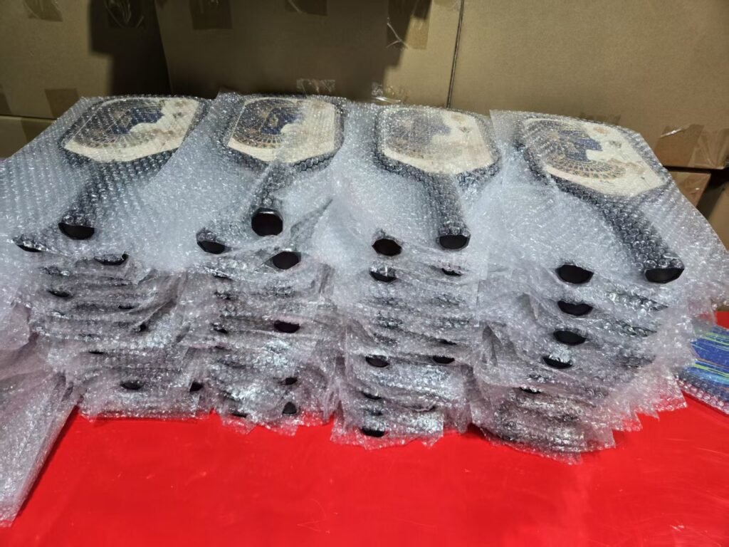 finished custom pickleball paddles ready for packaging and shipment
