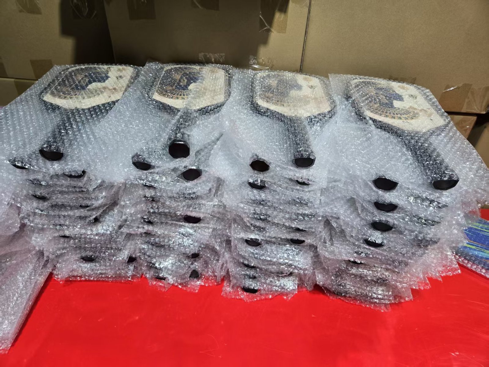 finished custom pickleball paddles ready for packaging and shipment